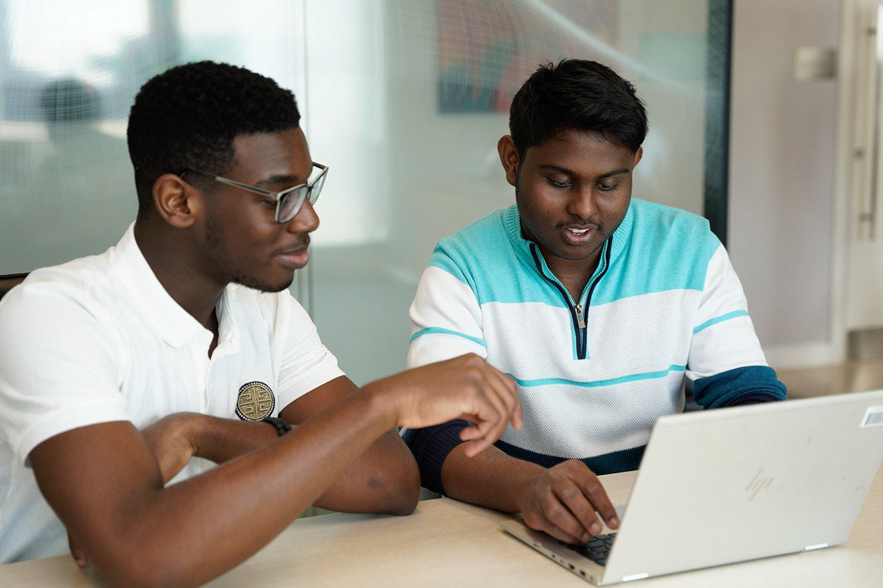 young people working on laptop